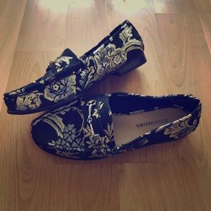 Black and gold flats